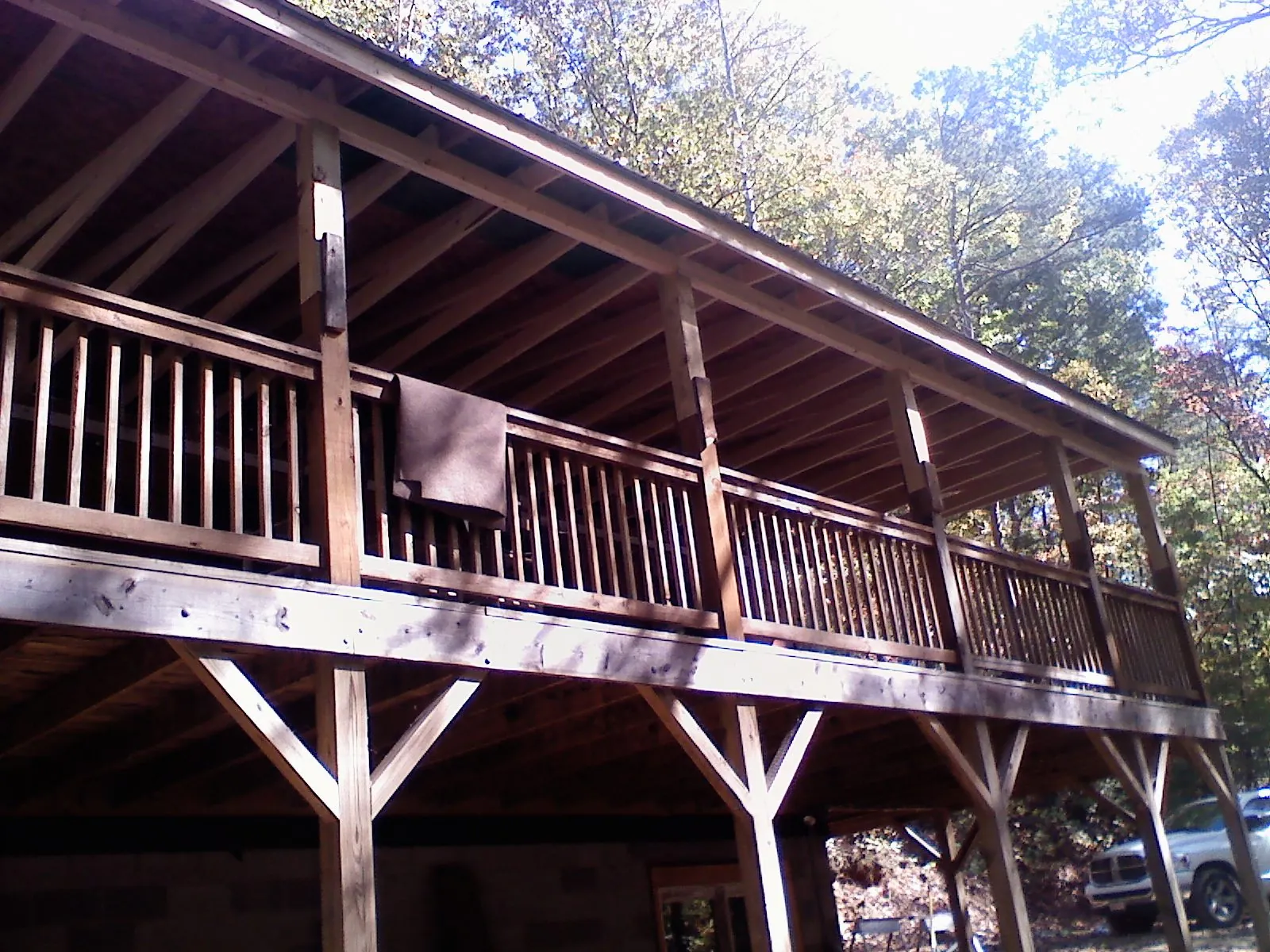 Timber framing under a new elevated porch and deck — Roof Leak Repair in Somerville by Roofing Brothers